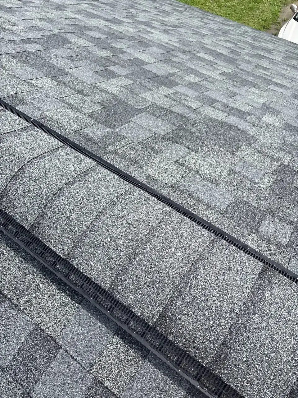 Ridge vent and gray architectural shingles in Ocala, Florida